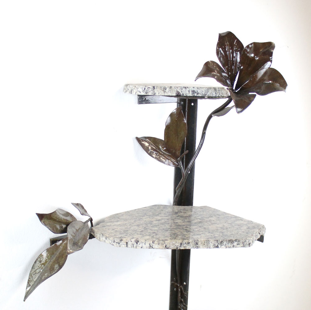 steel lilies and marble shelves